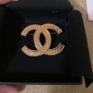Chanel CC brooch